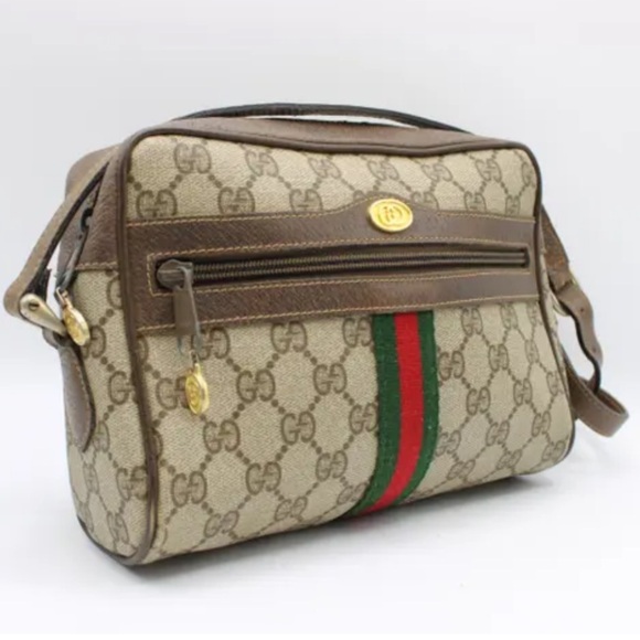 Gucci Handbags - Gucci Ophidia vintage Zip Around Camera leather crossbody bag
